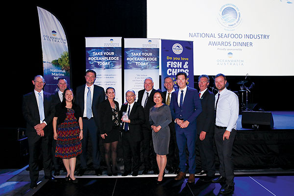 Photo of The team from Austral Fisheries (left to right): David Carter, Dylan Skinns, Camay Young, Sam Greaves, Jodie Blacker, Shin Tanabe, Clayton Nelson, Lily Zhang, Markus Gerlich, Sam Colvin, Martin Exel and Jay Shoesmith, celebrating their win