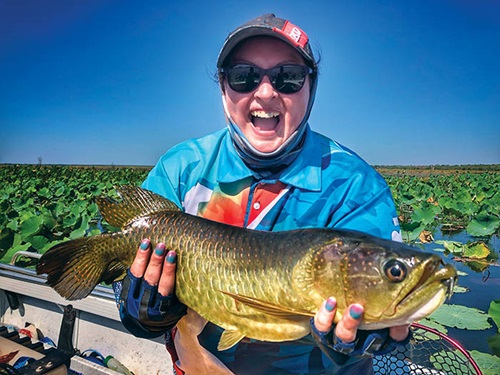 Photo of Nadia Taylor holding a fish