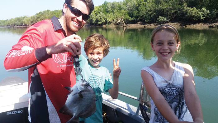 Matt Osborne takes his children Oliver and Laela fishing.  Photo: Carrie Osborne