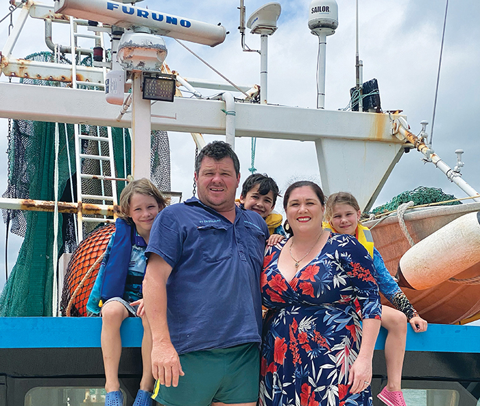 Image of Queensland fisher Kylie Dunstan (front, right) with her three children (back, from left) Lachlan, William and Chloe and her brother (front, left) Shane Paulsen, co-owner of Paulsen Fisheries Pty Ltd and skipper of the FV Angelina S. Photo: Supplied