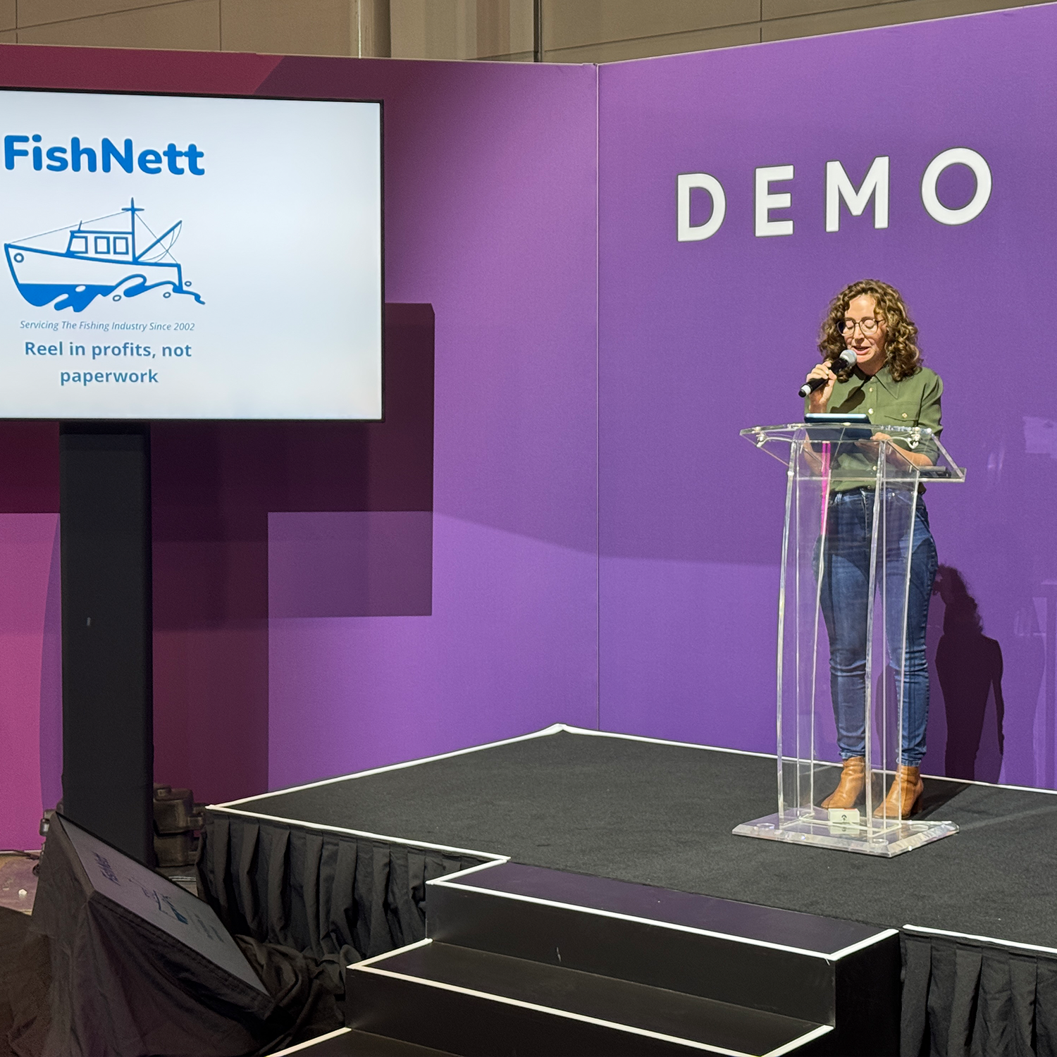 Cait Hopper presenting at the demo stand evokeAG.2025
