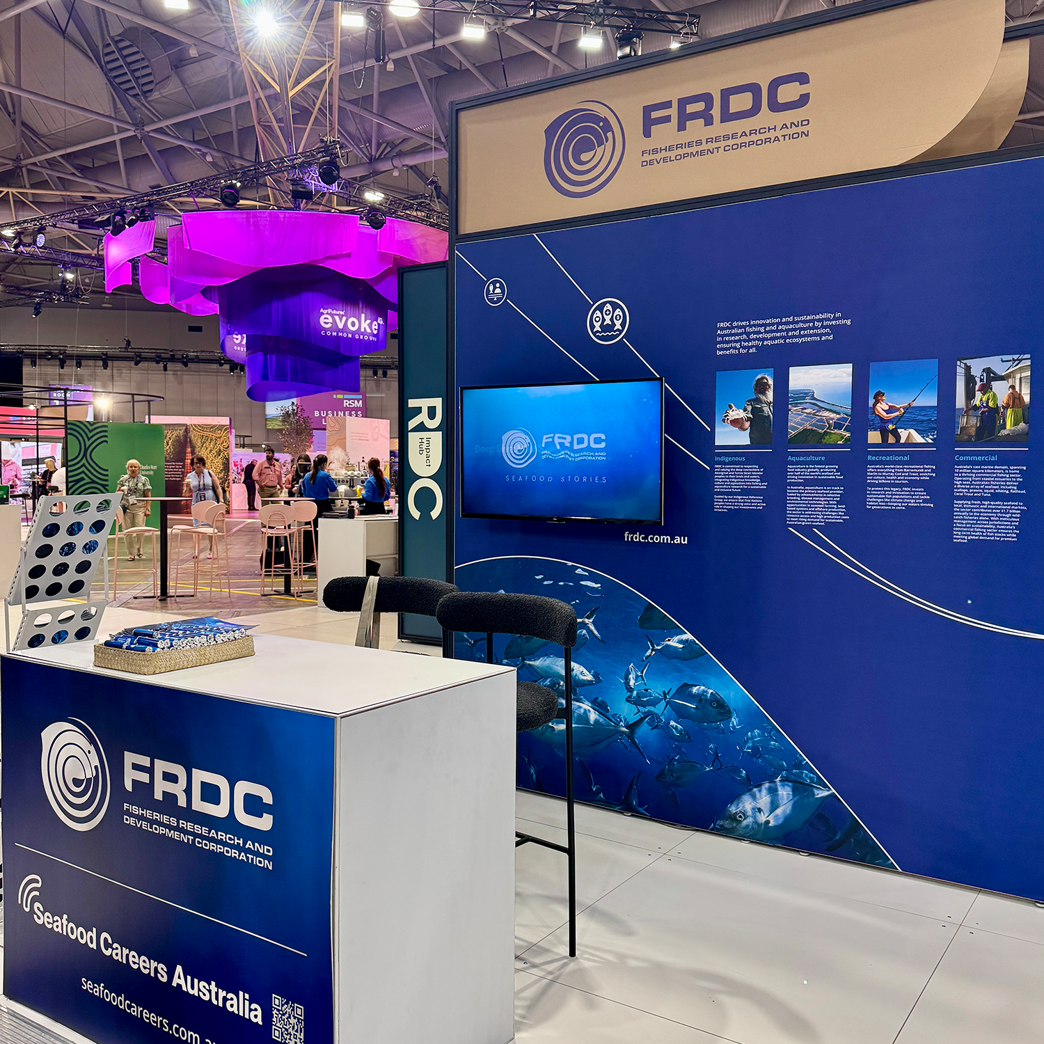 FRDC Booth at evokeAG 2025, large screen and branding