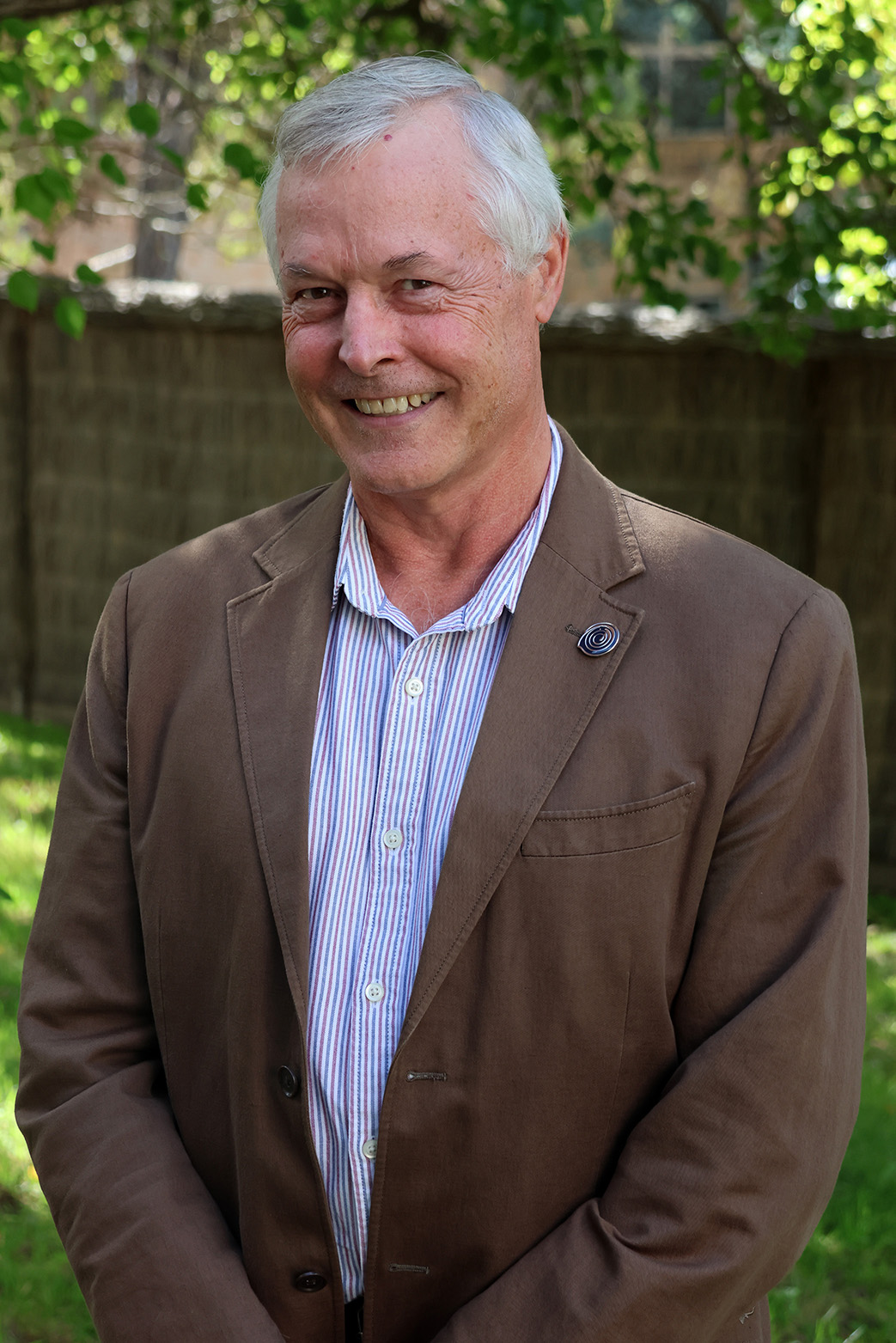 Dr Patrick Hone, Managing Director of FRDC, Smiling at Camera