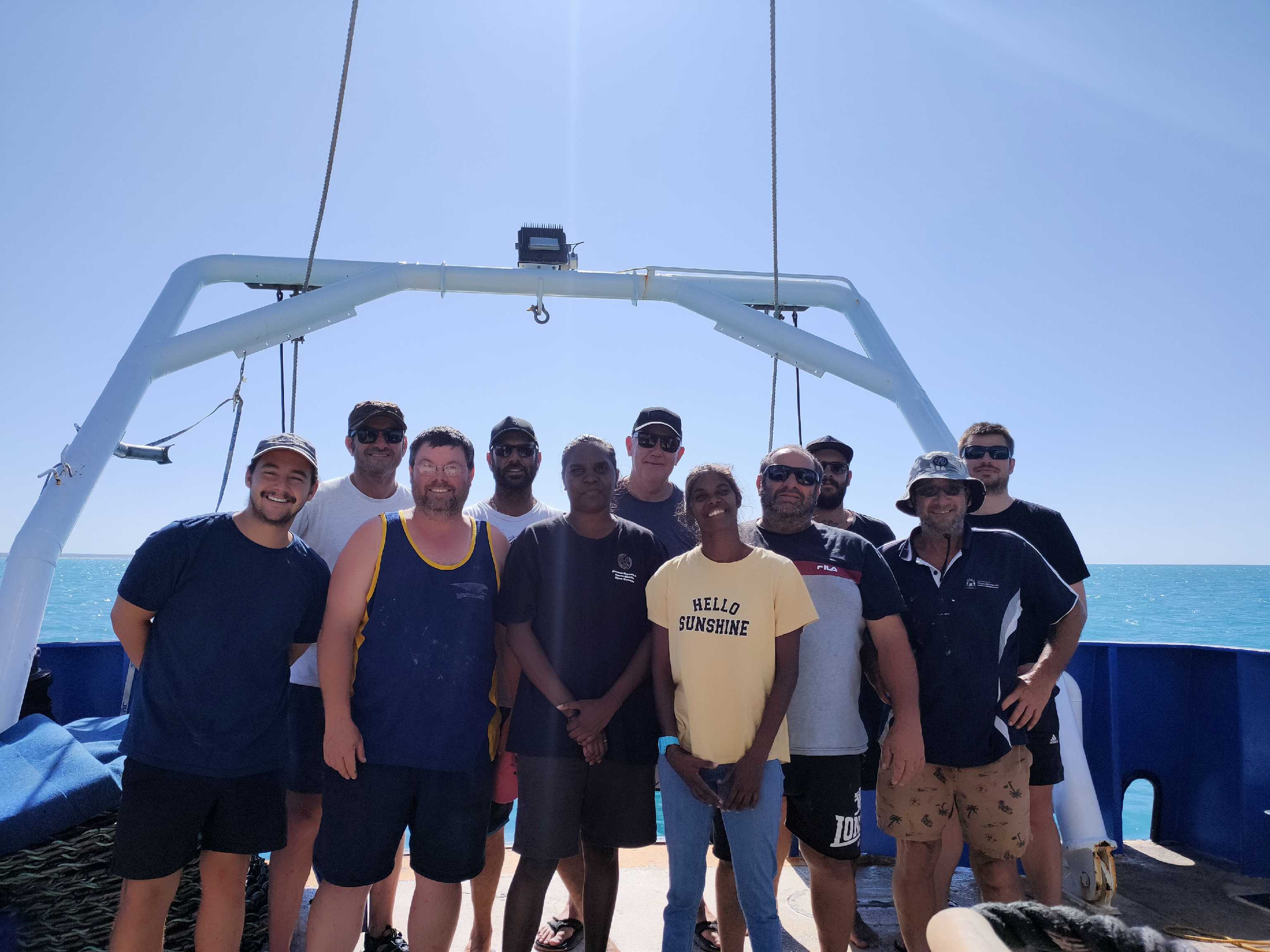 The Project team and collaborators posing on boat in Kimberley
