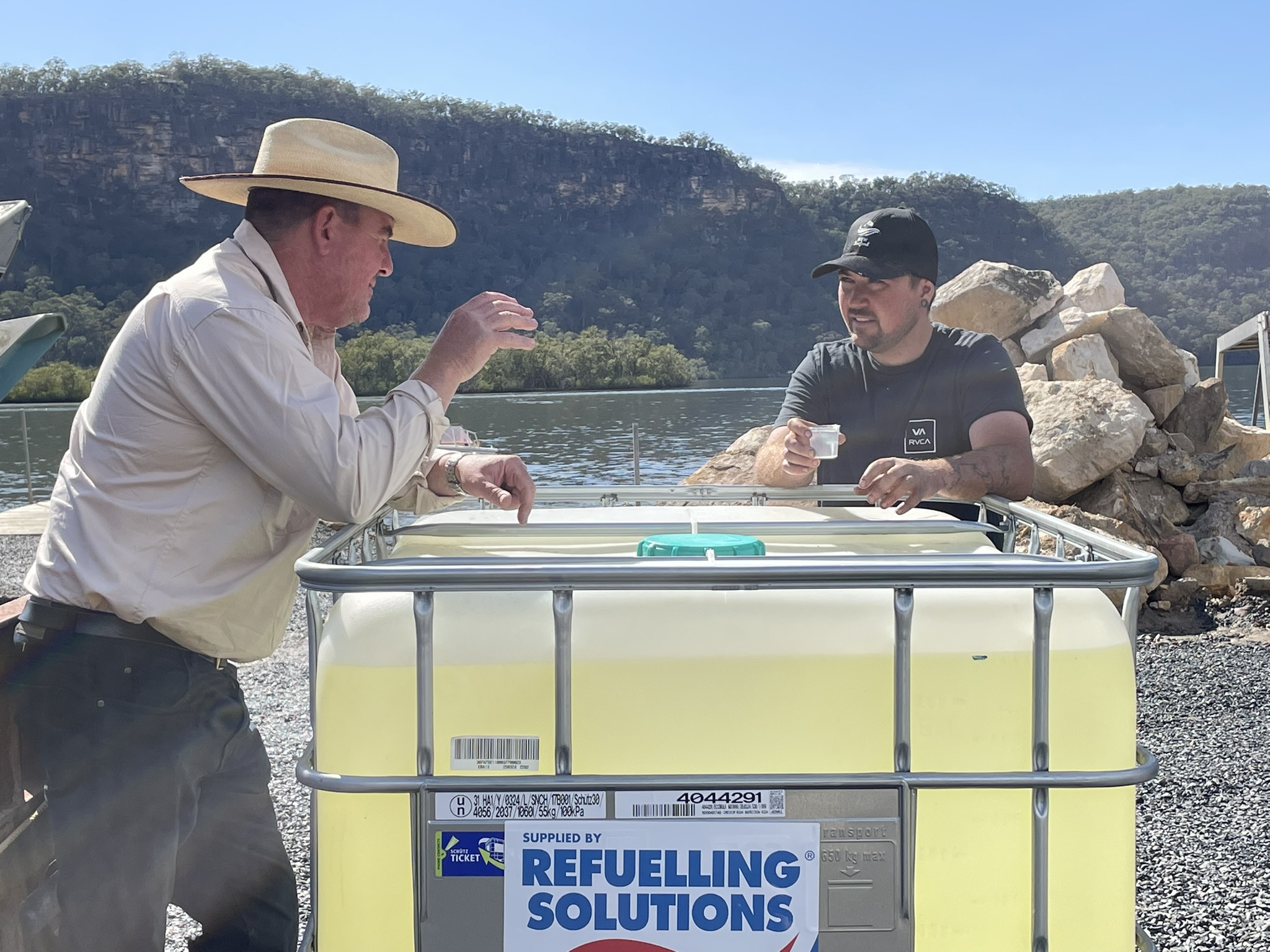 Beyond Fossil Diesel research officer Michael Cashen talking with fisher Paul Aquilina.