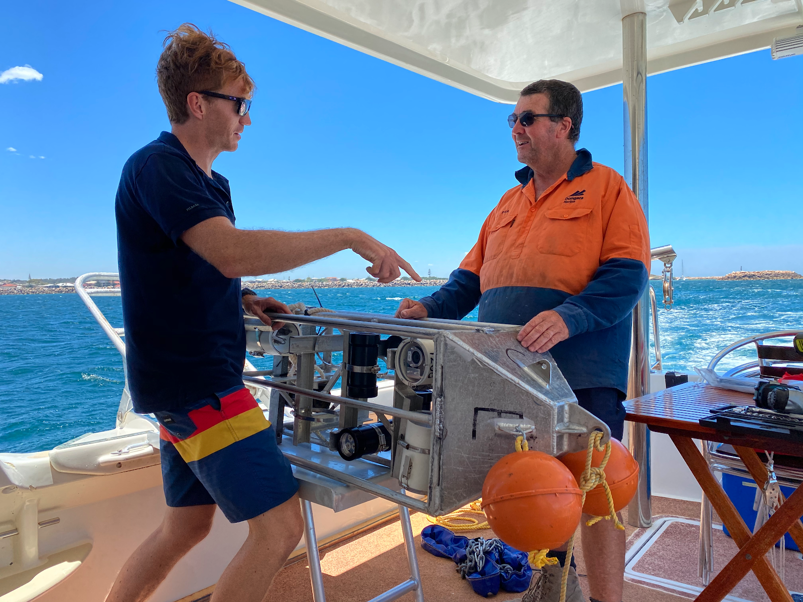PhD student Sam Thompson and Paul Warnock of Dongara Marine Boat Builders with a Benthic Observation Survey System (BOSS).
