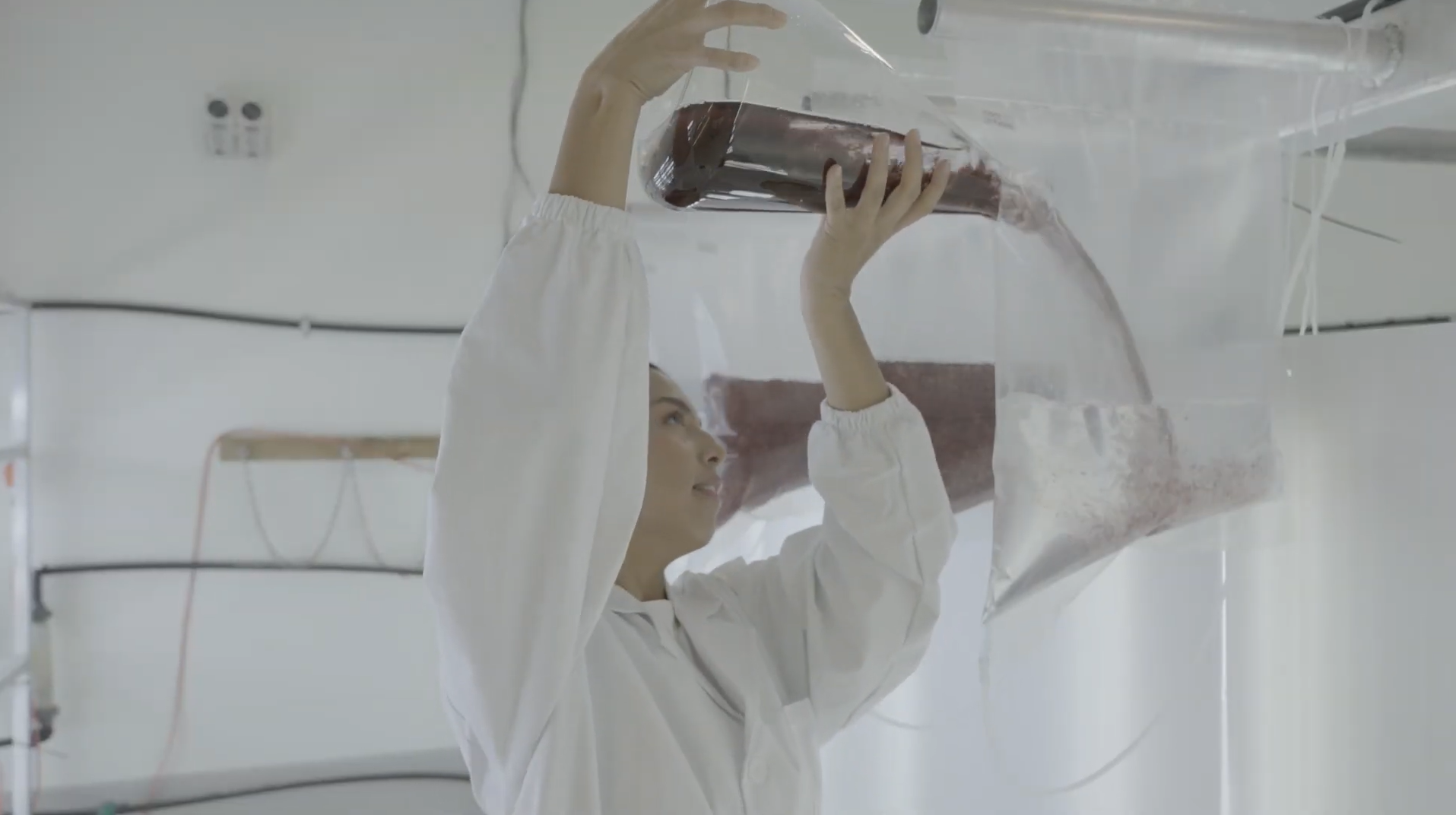 Ms. Olivia Stalemark pouring seaweed