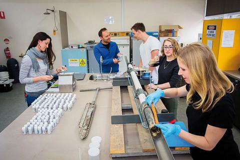 Photo of researchers in Deakin University's Blue Carbon Lab