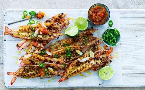 Photo of Butterflied jumbo prawns marinated in rum coconut chilli and lime served with a papaya jam