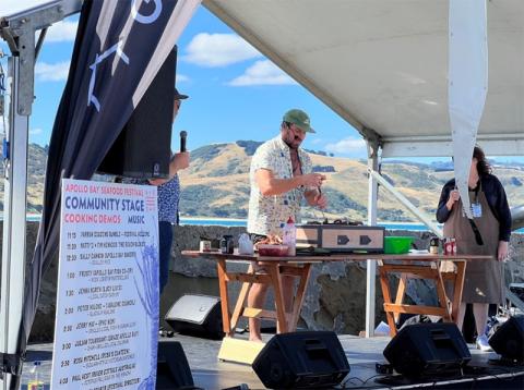 apollo-bay-photo1.jpg Photo of former River Cottage Australia Host, Paul West cooks up Octopus for the hungry crowds.