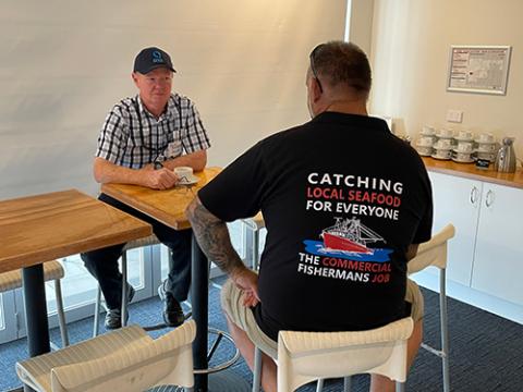 David Bobbermen (QSIA Chief Executive Officer) talking with commercial fisher Neil Mogensen