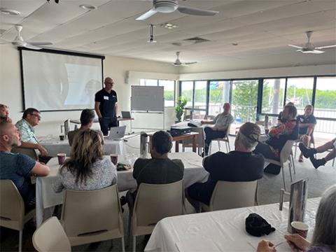 FRDC Extension Officer Steve Eayrs presenting to a room with 1500+ years’ fishing experience.